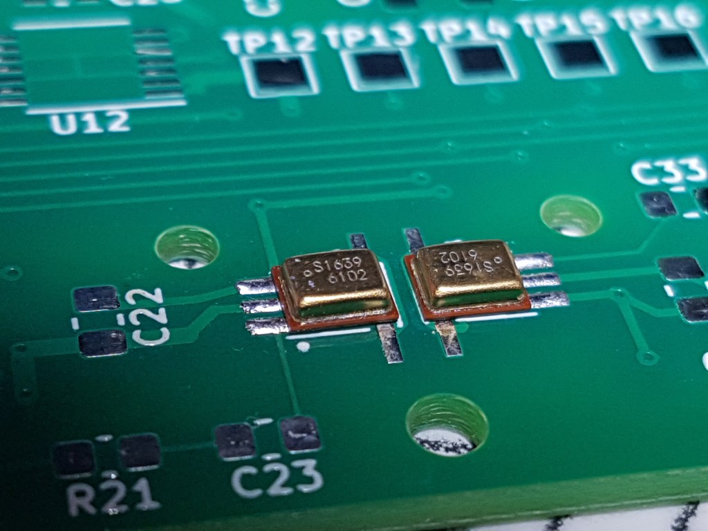 Close up of microphones soldered onto the PCB